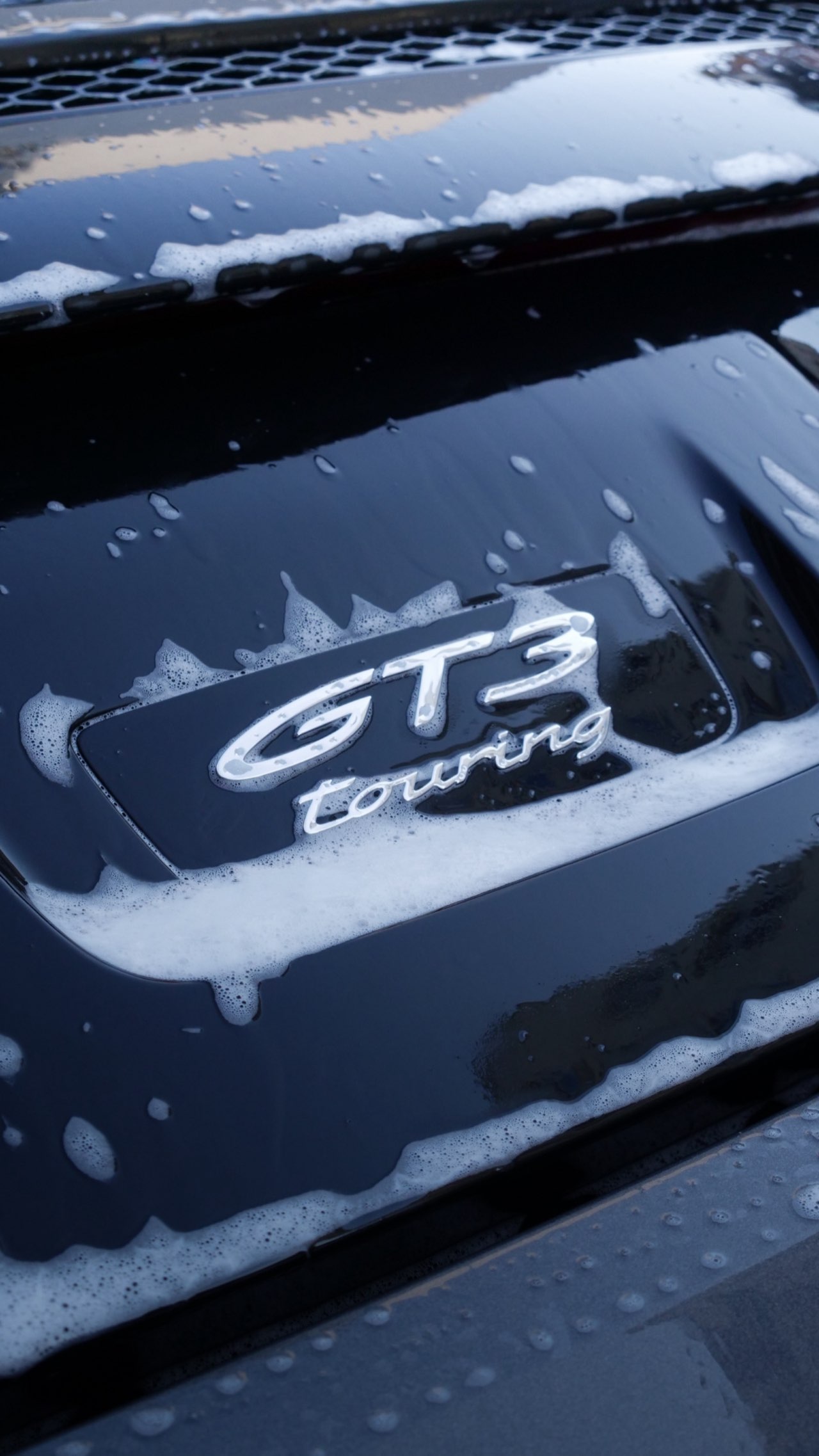 Badge GT3 — brillance céramique